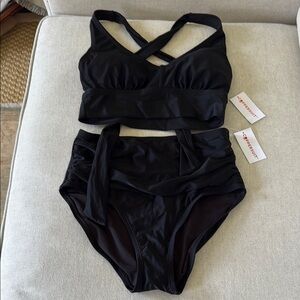 Copper Suit women’s black swimsuit